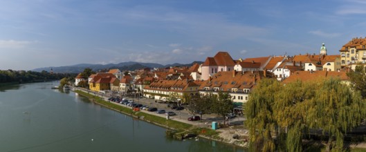 Maribor, Slovenia, 10 October, 2022: panorama view of the River Drava and the historic city center