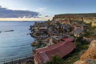 Mellieha, Malta, 20 December, 2023 view of idyllic Anchor Bay and Popeye Village amusement park in