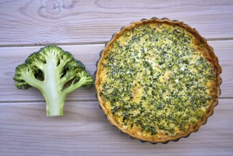 Broccoli quiche french recipe homemade on white wood board