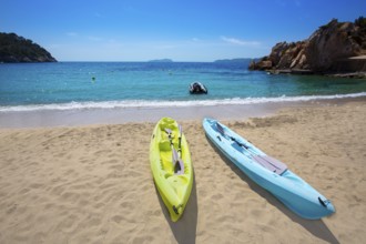 Ibiza cala Sant Vicent beach with Kayaks san Juan at Balearic Islands of spain