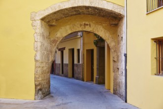 Valencia Portal de Valldigna arch in barrio del Carmen at Spain