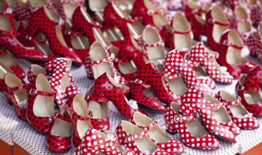 Gypsy red shoes with polka dot spots in shop market