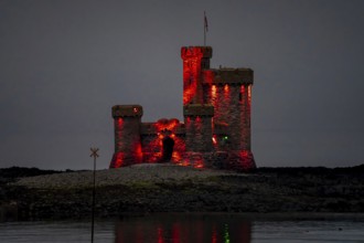 Douglas Bay and the illuminated Tower of Refuge at night, Isle of Man, Europe