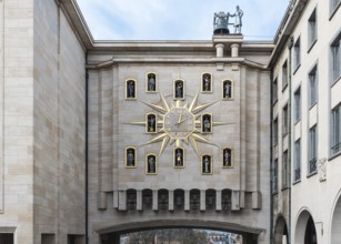 Brussels, Belgium, 12 18 2018: Statue and huge clock of the Mont des Arts, Europe