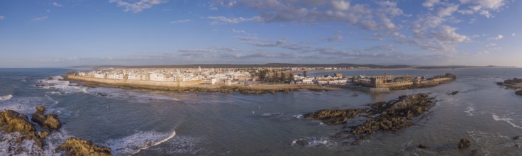 Aerial panorama of medieval Essaouira old city on Atlantic coast at sunset, Morocco, Africa