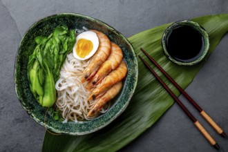 Food, Asian rice noodles with shrimps on gray background