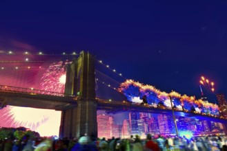 July 4th 2014 fireworks at Brooklyn bridge Manhattan skyline New York USA
