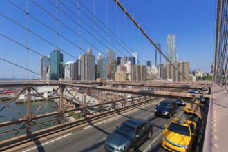 Brooklyn Bridge traffic and Manhattan New York City US USA