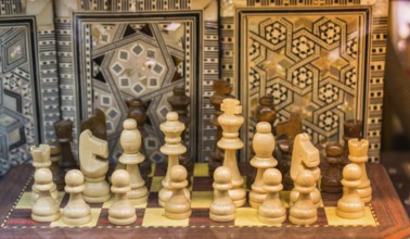 Intellectual game -chess. Wooden chess pieces on the chessboard