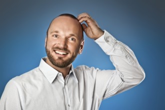 An image of a handsome man with a beard