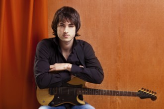 British indie pop rock look young musician guitar player man