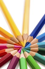 Many different coloured pencils on a white background. Austria