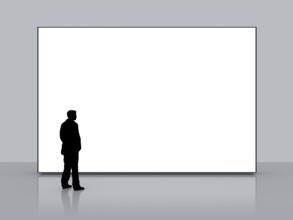 A man in front of a big white empty screen