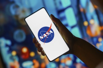 In this photo illustration, the NASA (National Aeronautics and Space Administration) logo is