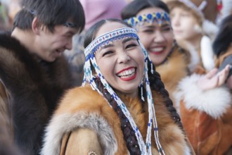 Portrait expression smiling woman in traditional clothing indigenous inhabitants of Kamchatka.