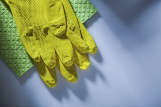 Kitchen dishwashing cloth safety gloves on white surface