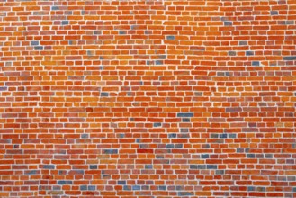 The background of the old red brick wall for design interior and various scenes or as a background