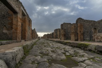 Pompei, Italy, 25 November, 2023: tyoical city street and houses in the ancient Roman town of