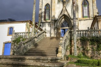 View to entrance stairway of church in sunlight, Sanctuary Caraca, Minas Gerais, Brazil, South