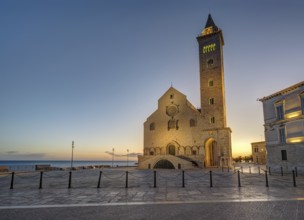 The Piazza Duomo with the famous cathedral in Trani at dusk