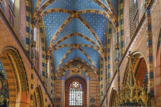 Saint Mary's Basilica is a Brick Gothic church adjacent to the Main Market Square in Kraków, Poland