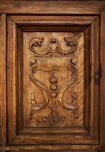 Alhambra Carlos V wooden door detail in Granada of spain