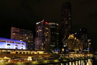 Central melbourne city river side modern urban skyline at night in australia