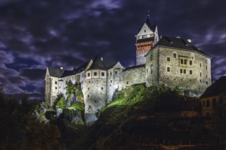 Loket Castle is a 12th-century Gothic style castle located about 12 km from Karlovy Vary on a