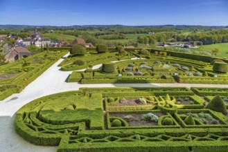 Chateau de Hautefort, France. View of the castle garden and surroundings