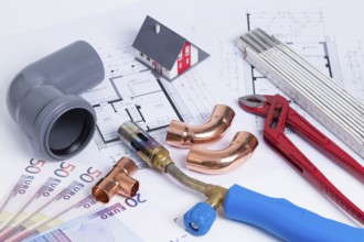 The photo shows various materials, tools of an installation company