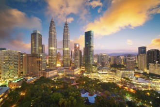 Beautiful Kuala Lumpur city skyline with dramatic sky, twilight scene . Malaysia