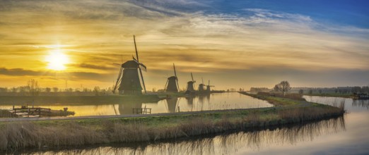 Rotterdam Netherlands, sunrise panorama nature landscape of Dutch Windmill at Kinderdijk Village