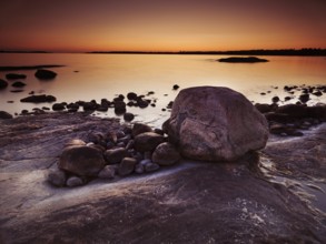 Beautiful twilight scenery of rocks on a shore of Georgian Bay, Muskoka, Ontario, Canada, North