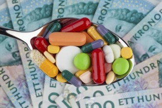 Swedish krona, the currency of Sweden. With tablets. Health costs. Austria