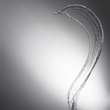 Water drop splash with grey background