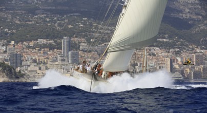 90-year-old sailing yacht Three-masted topsail schooner XARIFA sails during Monaco Classic Week.
