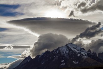 Incredible clouds of the Southern Hemisphere. Patagonia. The magnificent park of Torres del Paine.