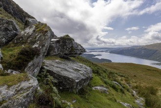 Rocks at the summit and views of Loch Lomond and the Loch Lomond and the Trossachs National Park