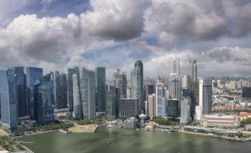 Skyline of skyscrapers in the city centre of Singapore at sunset