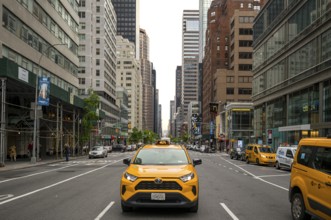New York, USA - May 18, 2024: Taxi drivers on the streets of Manhattan