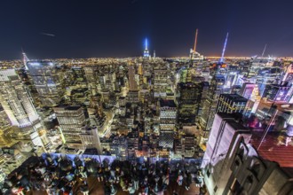Rockefeller Center Observation Deck people 5 a view of the night view from the (top of the Rock).