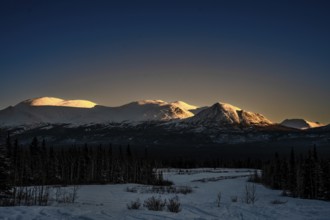 Snow-covered mountains in the light of the sunset, Yukon, Canada, Kluane National Park, North