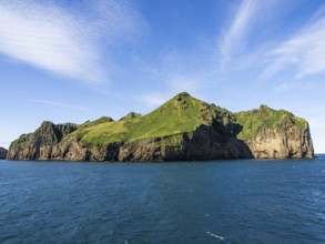 Steep cliffs in the blue sea, Westman Islands, Iceland, Europe