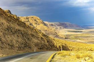 Wonder of nature - the Dead Sea. The highway runs along the coast of the Dead Sea. Cloudy and warm