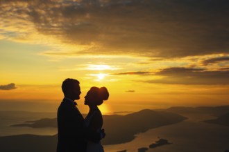 Silhouettes at sunset on Mount Lovcen in Montenegro