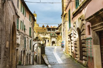 Narrow streets of the picturesque tuff town of Sorano. Etruscan towns of Tuscany. Fairy-tale stone