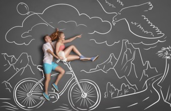 Happy Valentine's Day love story concept of a romantic couple on chalk drawings background of
