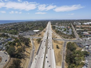 Aerial view of highway transportation with small traffic, highway interchange and junction, San