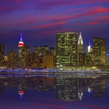 Manhattan New York skyline at sunset dusk from East River NYC USA