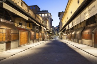 Florence, Italy, circa July 2021. Night light on Ponte Vecchio, Old Bridge, Europe